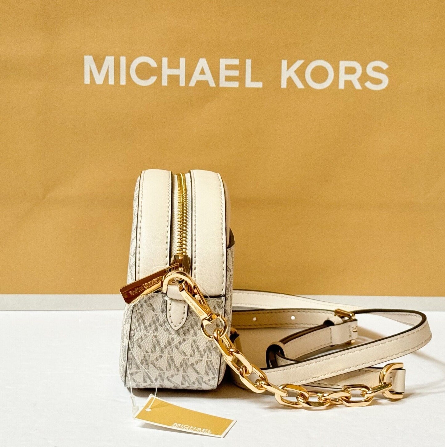 MICHAEL KORS JET SET GLAM SMALL FRONT POCKET OVAL CROSSBODY BAG MK LIGHT CREAM